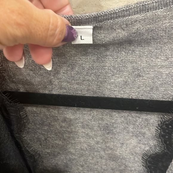 Black and grey lace trimmed criss cross thin sweater. Size large. Never worn. - Picture 4 of 6